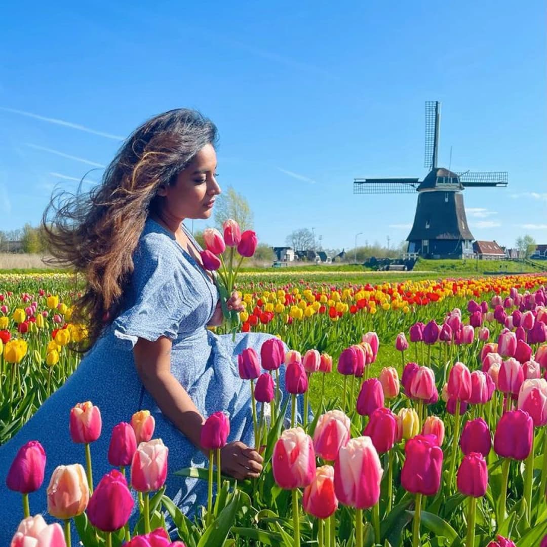 girl posing in tulip field